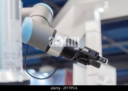 Close up view of moving futuristic robotic clamp arms at robot exhibition Stock Photo