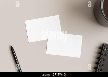 Two white business cards mockup 85x55mm. Workspace concept. Stock Photo