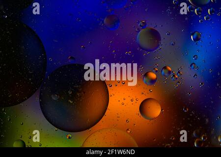 Abstract colorful Background Oil in Water surface with Bubbles. macro shot close-up. Stock Photo