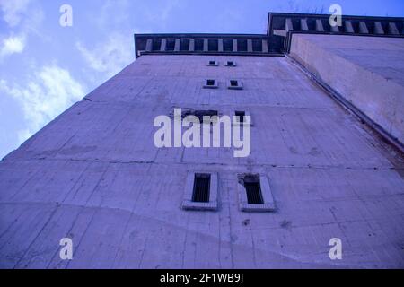 Facade of a old destroyed Berlin Bunker in MItte Stock Photo