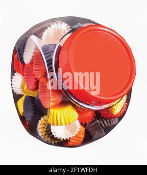 Paper baskets in a glass jar, a product used by the food industry or confectioneries Stock Photo