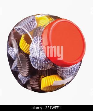 Paper baskets in a glass jar, a product used by the food industry or confectioneries Stock Photo