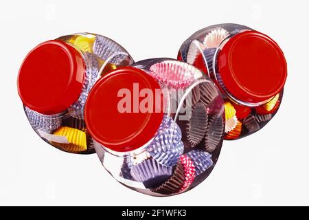 Paper baskets in a glass jars, a product used by the food industry or confectioneries Stock Photo