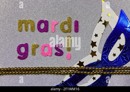 Mardi Gras Party Masks With Bead String On Silver Stock Photo