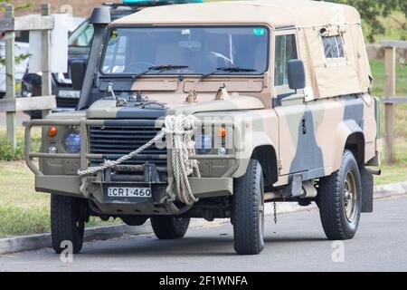 Classic Land Rover defender vehicle in Sydney Australia in army camouflage colours. Stock Photo