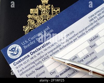 Passport on U.S. customs and border form Stock Photo