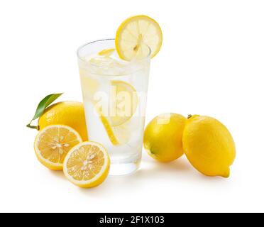 Lemons on a white background and lemon sour in a glass Stock Photo