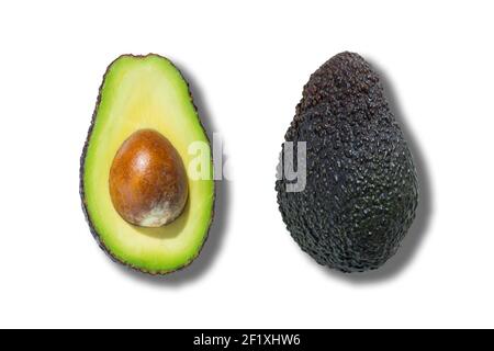 Fresh ripe avocado fruit isolated on white background. Half cut view. Top view Stock Photo