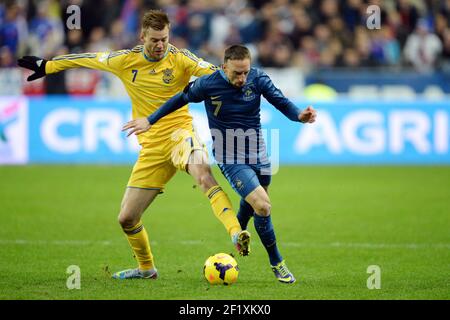 France's Franck Ribery vies with Ukraine's Andriy Yarmolenko during the 2014 World Cup qualifying play-off second leg football match between France and Ukraine at the Stade de France in Saint-Denis, outside Paris, on November 19, 2013. Photo Philippe Millereau / KMSP / DPPI Stock Photo