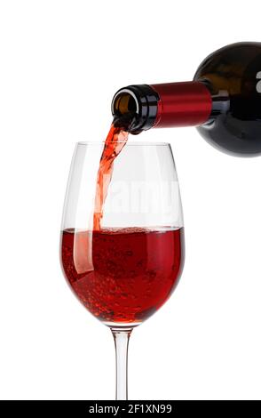 Red wine pouring in glass Stock Photo