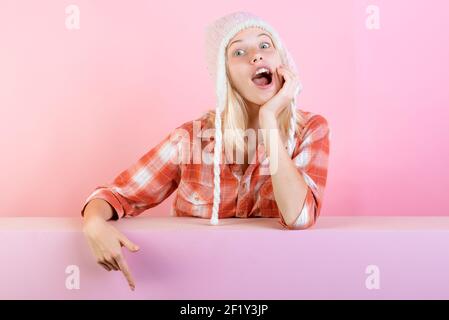 Girl for Sale for entire autumn collection, incredible discounts and wonderful choice. Beautiful young woman on pink background. Stock Photo