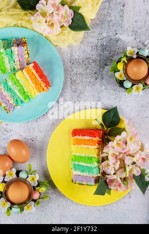 Beautiful Easter cakes with eggs and flowers. Top view. Stock Photo