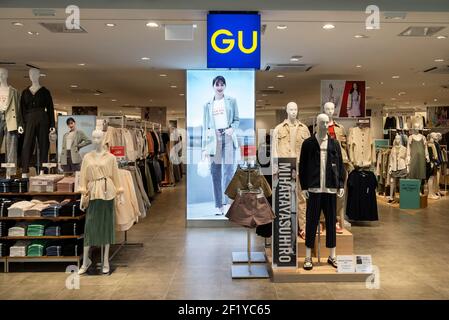 Japanese clothing brand GU store seen in Hong Kong. (Photo by