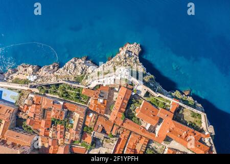 Aerial overhead view of Church of St. Marija in Dubrovnik city wall by Adriatic sea in Croatia summer Stock Photo