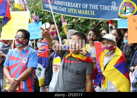 Sydney, Australia. 10th March 2021. Tibetans and supporters commemorate the 62nd Tibetan Uprising Day with rallies in cities across Australia and globally. In Sydney protesters held a rally in Martin Place before marching to the Consulate General of the People's Republic of China at 39 Dunblane St, Camperdown. On 10 March 1959, almost a decade after the Chinese invasion, Tibetans took to the streets of capital Lhasa to protect their leader, the Dalai Lama and their nation’s future. China’s brutal crackdown led to the loss of thousands of Tibetan lives and forced the Dalai Lama to flee into exi Stock Photo