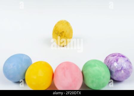 Easter egg decorated with glitter. Easter eggs on a white background. Blurred colorful Easter eggs Stock Photo