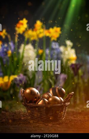 Easter eggs in wicker basket Stock Photo