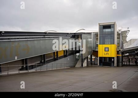 Brisbane Airport, Queensland, Australia - March 2021: Escalator and elevator up to the second level at Brisbane domestic airport Stock Photo