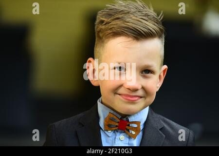 Portrait of schoolboy in suit outdoor. Back to school. September 1, education and learning. Stock Photo