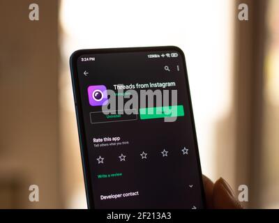 Assam, india - March 10, 2021 : Threads from Instagram logo on phone screen stock image. Stock Photo