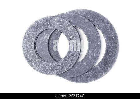 Paronite gaskets for flange connections of pipelines isolated on white Stock Photo