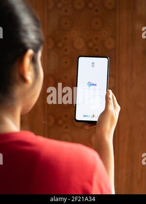 Assam, india - March 10, 2021 : Gim logo on phone screen stock image. Stock Photo