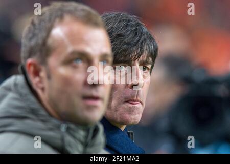 Amsterdam, Niederlande. 10th Mar, 2021. Hans Dieter Flick (Hansi, coach FC Bayern Munich) preferred candidate on the aftermath of national coach Joachim Jogi LOEW (GER) Archive photo: coach, coach Joachim LOEW (LÅw, GER) and left, blurred, co-coach, assistant coach Hans, Hansi FLICK (GER); Soccer Laenderspiel, Netherlands (NED) - Germany (GER) 0: 0, on November 14th, 2012 in Amsterdam/Netherlands; Â | usage worldwide Credit: dpa/Alamy Live News Stock Photo