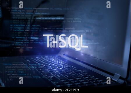 T-SQL inscription against laptop and code background. Learn sql programming language, computer courses, training. Stock Photo