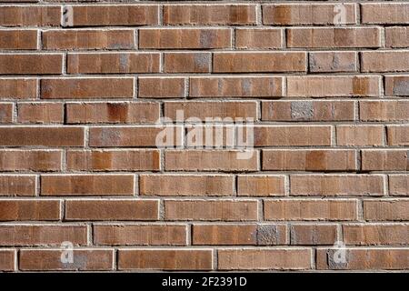 Background from a wall made of brown bricks Stock Photo