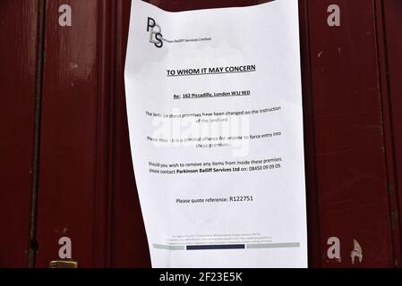 Piccadilly, London, UK. 10th Mar 2021. Lockdown: closed and locked Patisserie Valerie, locks changed by the landlord. Credit: Matthew Chattle/Alamy Live News Stock Photo