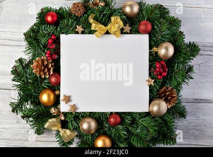 Christmas tree branches with paper card note Stock Photo