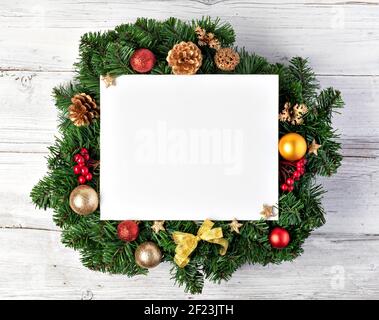 Christmas tree branches with paper card note Stock Photo