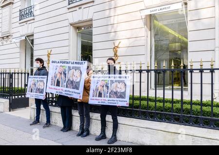 Paris France. 10th Mar 2021. Animal rights activists take part in a