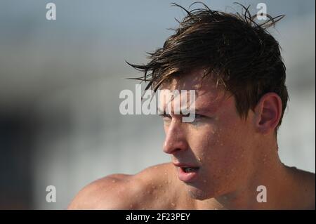 GROUSSET Maxime of France competes during the men's 100-meter butterfly