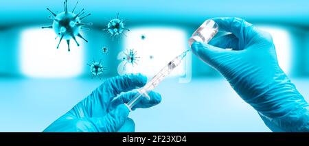 Hand holding viol with vaccine against corona virus. Stock Photo