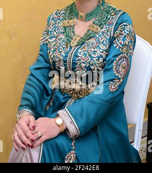 Moroccan girl wears Moroccan traditional dress. The Moroccan caftan is one of the most famous clothes in history Stock Photo