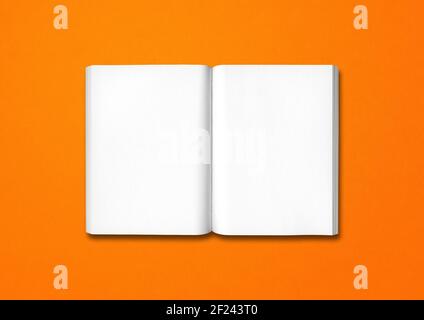 Open book isolated on orange Stock Photo