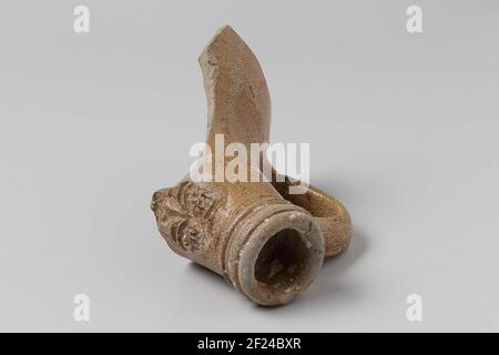 Neck of bearded manner from the wreck of the East India Hollandia.Stoneware, Rhenish, Frechen-Ware, Jug; Fragment, Neck of Bellararmine: Relieved Bands on Exterior, With Vertical Handle, Grooved and Fragment or Mask Appliqué. Stock Photo