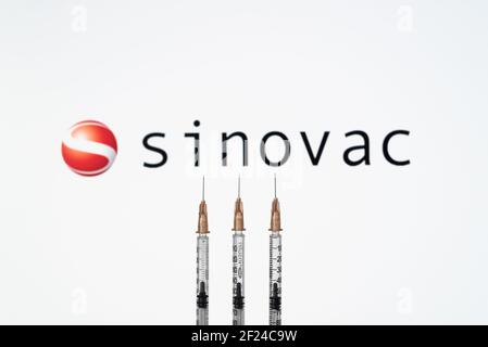 Izmir, Turkey - February 21 2021: Coronavirus vaccine concept and background. Sinovac vaccine syringes isolated on white background. Covid-19, 2019-nC Stock Photo