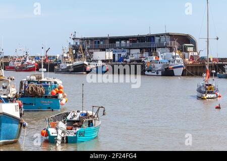 Boats moored at the fish quay in Bridlington, East Yorkshire to unload their catch Stock Photo