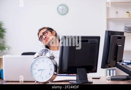 Young male it specialist working in the office Stock Photo