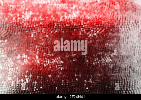 dark red and grey grungy surface, abstract blurry background Stock Photo