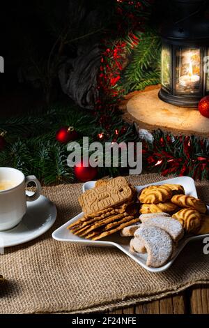 Different types of biscuits with rustic Christmas decorations Stock Photo