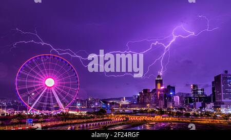 Lightning over city - Victoria Harbour, Hong Kong Stock Photo