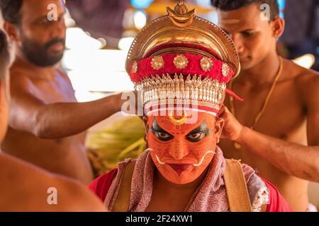 Payyanur, India - December 5, 2019: Portrait of an unidentified Theyyam dancer during temple festival in Payyanur, Kerala, India. Theyyam is a popular Stock Photo