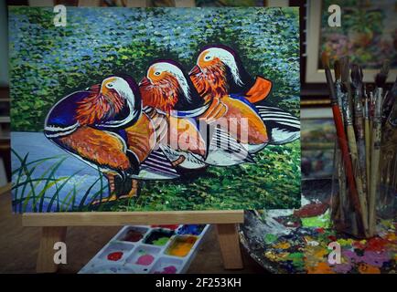 oil color Palette , paintbrush , Art painting Acrylic color Mandarin duck Stock Photo