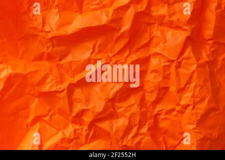 Blank orange wrinkled crumpled paper texture. Creative wallpaper Stock Photo