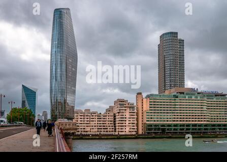 London / UK - September 20 2018: The Blackfriars bridge that spans river Thames with the One Blackfriars Tower (a.k.a. The Vase) and the South Bank To Stock Photo