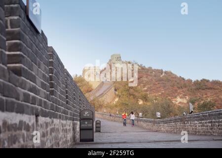 Young couples take pictures in the Great Wall Tourism Stock Photo