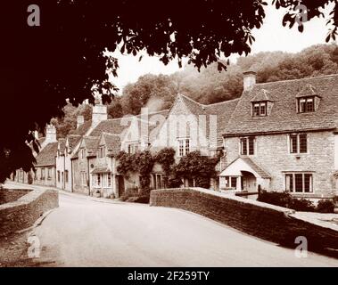 A sepia toned image of the Cotswold village of Castle Combe, Wiltshire UK - The picture was taken in 1998 on a 5'x4' paper negative. Stock Photo